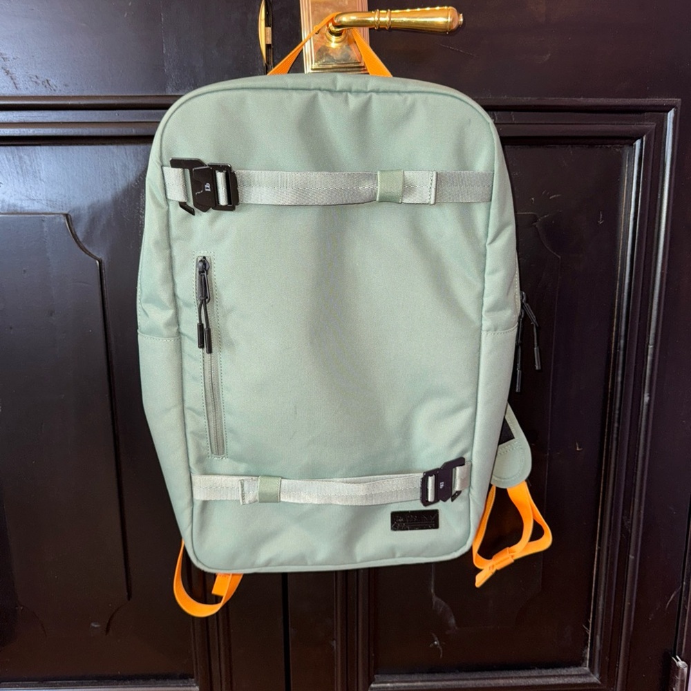 Modern Green and Orange Backpack for Everyday Use